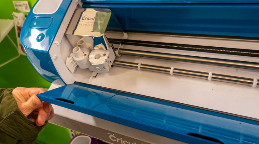 customer looking at cricut machine